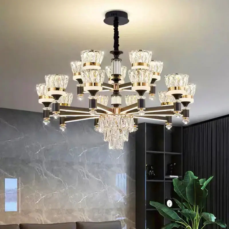 Elegant decorbites crystal chandelier pendant light with black and gold metal frame and faceted glass shades for living room