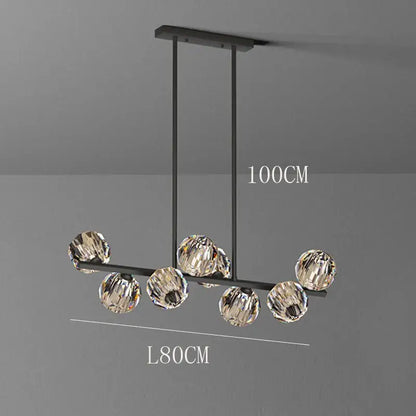Modern black metal pendant light featuring seven faceted crystal spheres in the DecorBites crystal chandelier pendant
