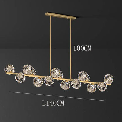Gold-toned DecorBites crystal chandelier pendant light with ten faceted crystal spheres for living and dining rooms
