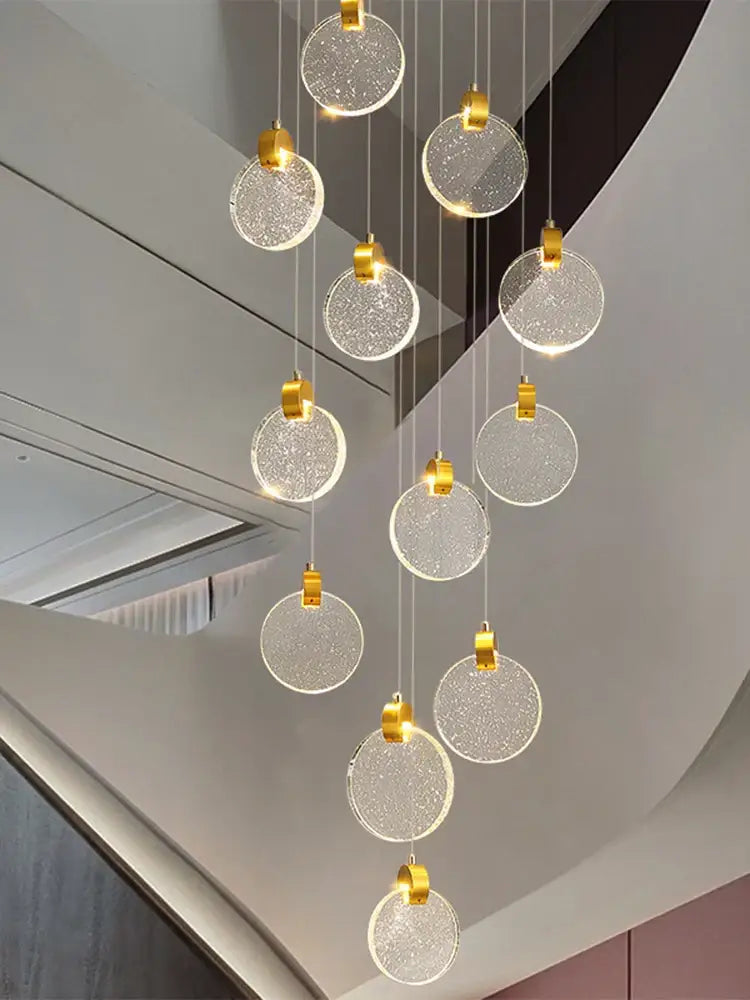 Modern glass pendant light with golden accents and sparkling circular crystals decorbites crystal chandelier for staircase