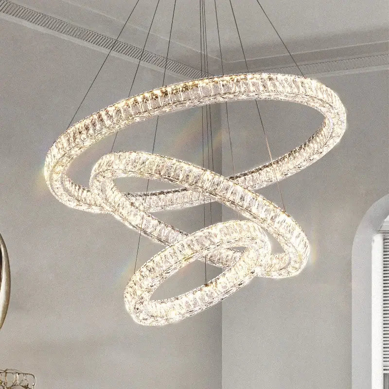 Decorbites crystal chandelier ring with multi-tiered interlocking rings and sleek metallic frame for elegant lighting