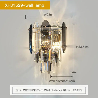 Decorbites crystal chandelier featuring a black metal frame with clear and dark blue crystal prisms in vertical tiers