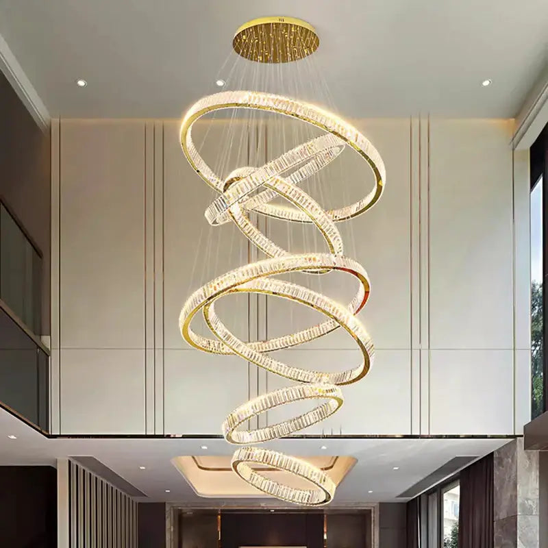 Golden spiral decorbites crystal chandelier with crystal-encrusted rings and circular ceiling mount for living room lighting