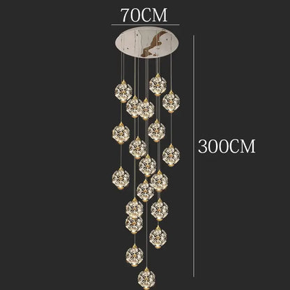 A decorbites crystal chandelier pendant lamp with gold chains and clear glass spheres for stair or living room lighting