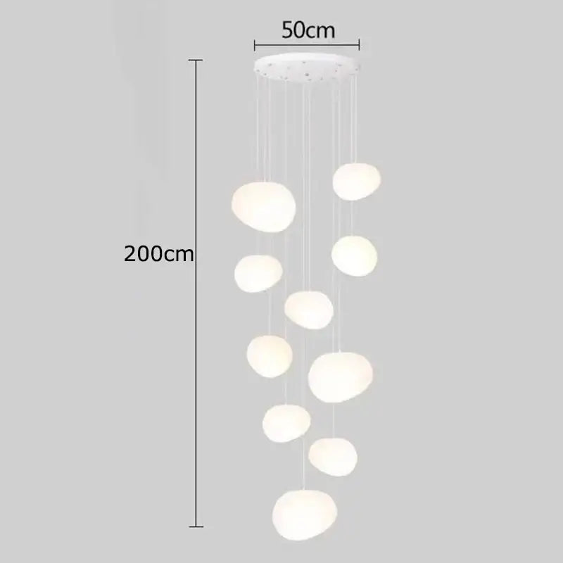 A modern white DecorBites crystal chandelier stair pendant lamp with irregular glowing spheres for living room lighting