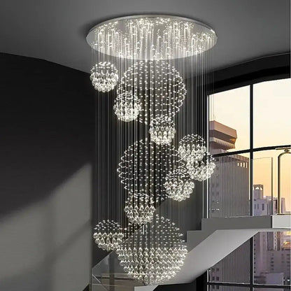 A modern decorbites crystal chandelier stair pendant with clear crystal beads and bright sparkling light for living rooms