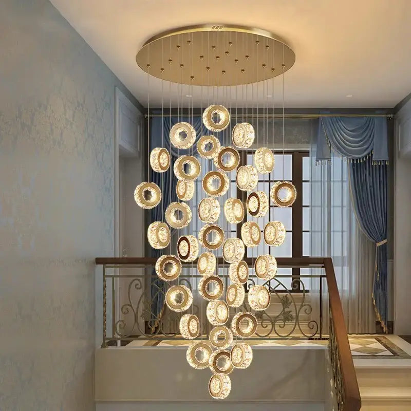 Golden circular decorbites crystal chandelier with modern cascading design for stair pendant interior lighting