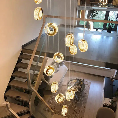Golden crystal chandelier stair pendant light with circular ring-shaped lights by decorbites for living room lighting