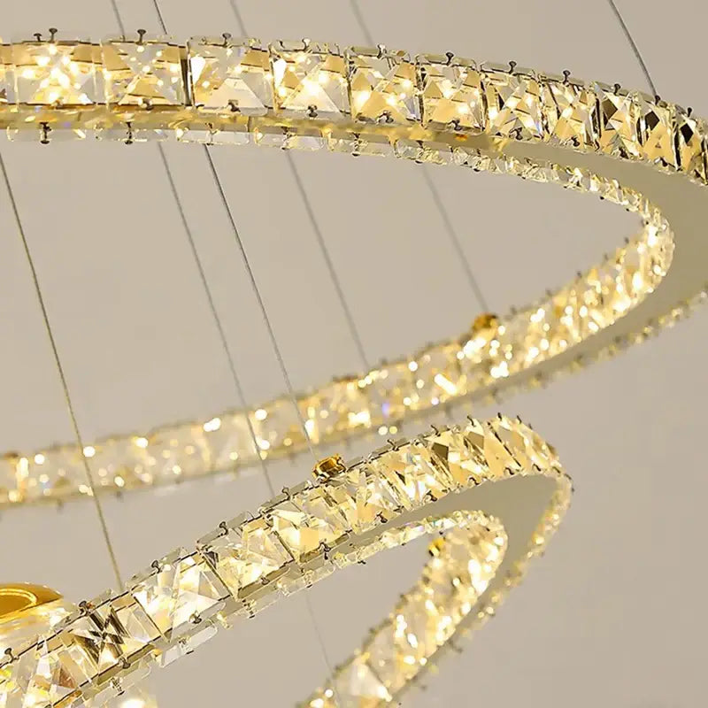 Golden spiral decorbites crystal chandelier with concentric rings and faceted crystal squares for living room lighting