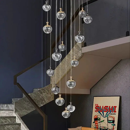 A decorbites crystal chandelier stair pendant lamp with clear crackled glass globes and gold-toned metal fixtures