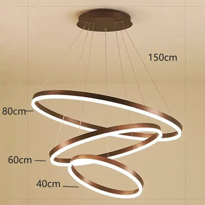 Modern bronze-finished decorbites crystal chandelier pendant lamp with three glowing interlocking rings for stair lighting