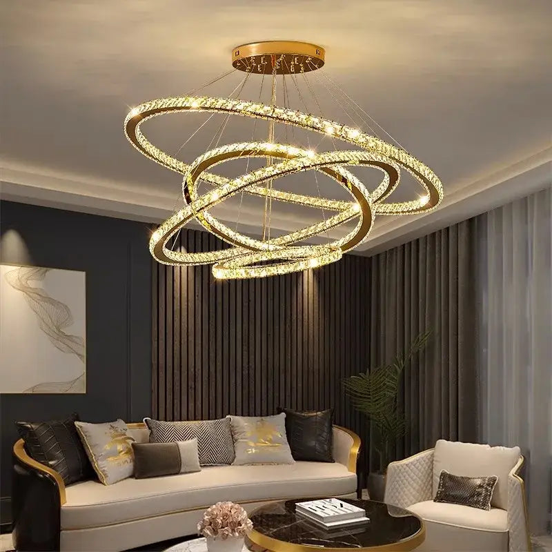 Golden crystal chandelier stair pendant light by DecorBites with interlocking rings and embedded lights for living room decor