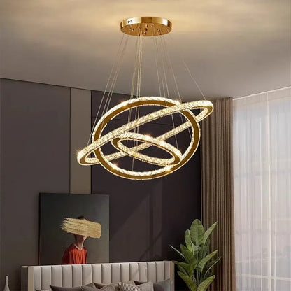 Gold-toned decorbites crystal chandelier pendant light with interlocking crystal rings for stair or living room lighting