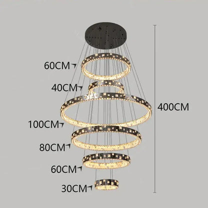 Modern DecorBites crystal chandelier stair pendant with tiered concentric rings, sparkling crystals, and warm LED lighting