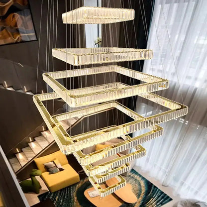 A modern DecorBites crystal chandelier stair pendant lamp with cascading rectangular crystals and gold-toned accents
