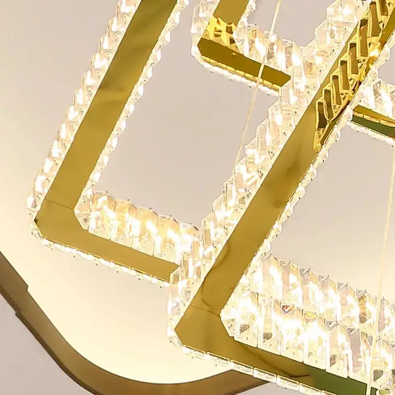 Gold-toned DecorBites crystal chandelier pendant lamp with faceted crystal accents for stair and living room lighting