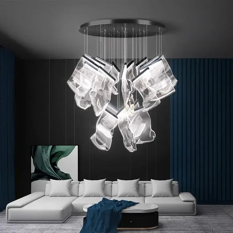 Modern decorbites crystal chandelier pendant light with translucent sculptural glass elements and metallic circular base