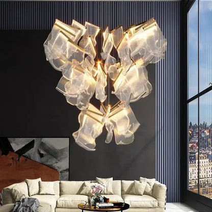 A modern DecorBites crystal chandelier stair pendant light with translucent glass and warm golden lighting
