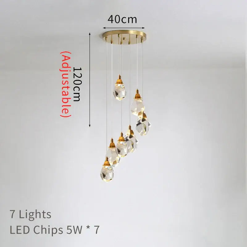 A decorbites crystal chandelier with gold circular mount and seven clear crystal teardrops for staircase lighting