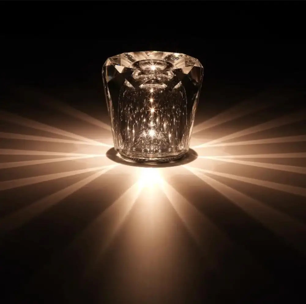A clear glass faceted crystal diamond night light by decorbites with geometric cuts for bedroom decor