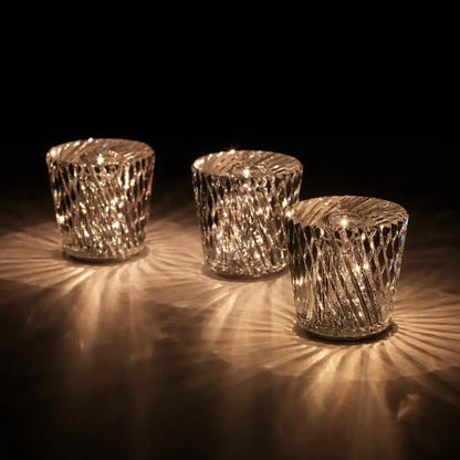 Three elegant clear crystal diamond night light candle holders with intricate faceted patterns from Decorbites