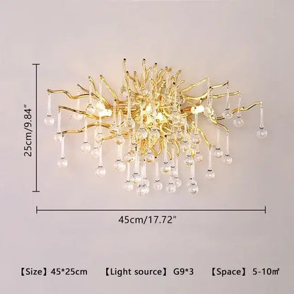 Gold-toned decorbites crystal drop chandelier with intricate branching arms and dangling crystal droplets for dining room