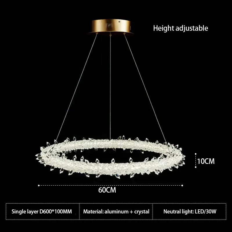 A modern decorbites crystal flower led chandelier with clear crystal rings and gold aluminum ceiling mount for dining rooms