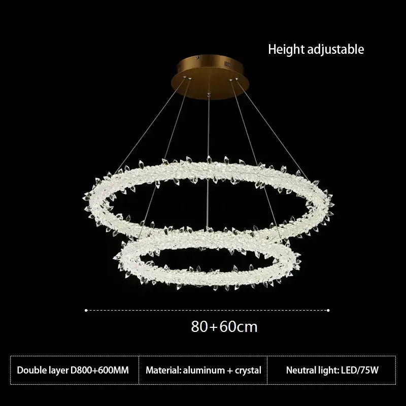 A modern decorbites crystal flower led chandelier with gold mount and double-layer clear faceted crystals for dining room