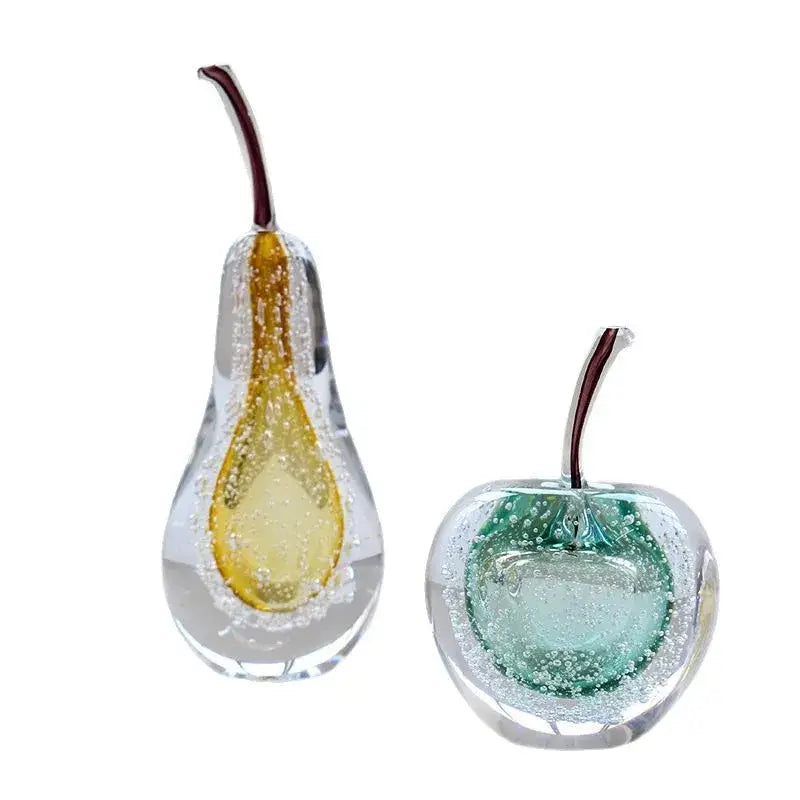 Decorbites crystal glass fruit sculptures featuring a glass apple pear and green centered cherry with embedded bubbles