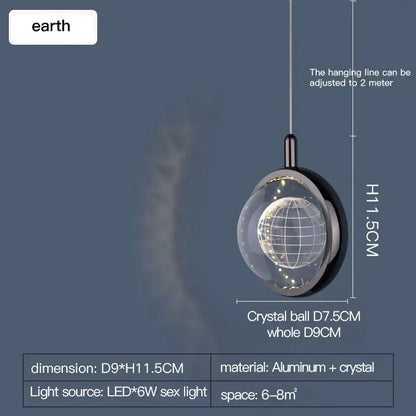A modern decorbites crystal jellyfish chandelier pendant light with a clear crystal globe and black aluminum frame