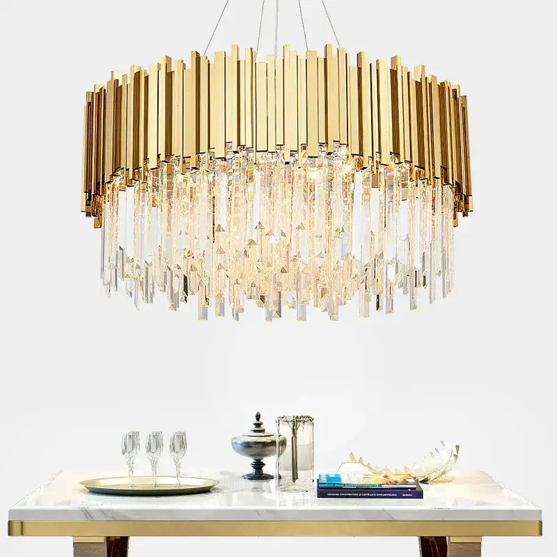 Gold-toned decorbites crystal led chandelier with vertical bars and cascading crystal prisms for living room lighting