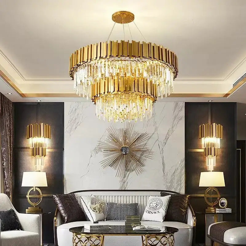 Gold-toned decorbites crystal led chandelier with cascading crystal strands and modern tiered design for living room use