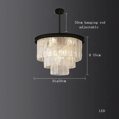 A tiered translucent glass decorbites crystal led chandelier with a black metal frame and adjustable hanging rod