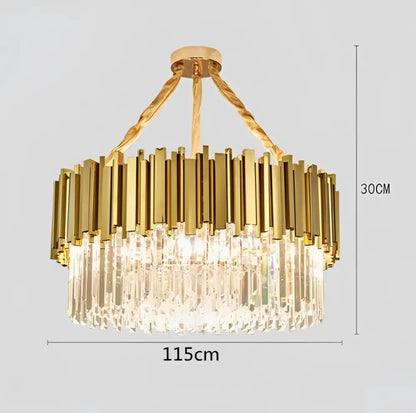Gold-toned decorbites crystal led pendant chandelier with vertical crystal prisms and twisted brass chains for dining room