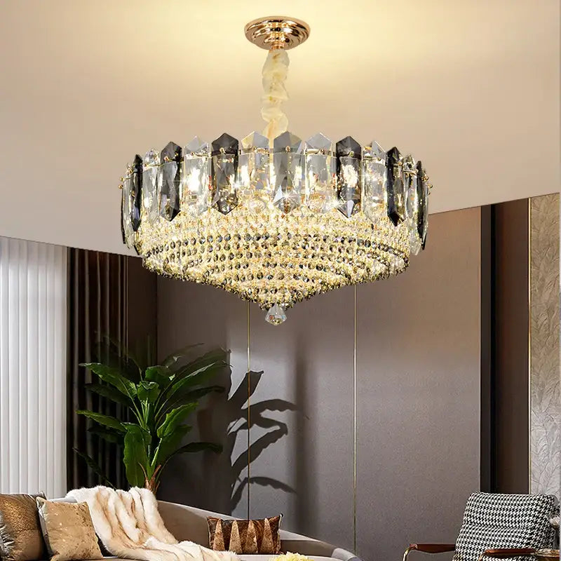 Modern gold tiered crystal light chandelier with clear and dark prisms for elegant dining room decorbites crystal light