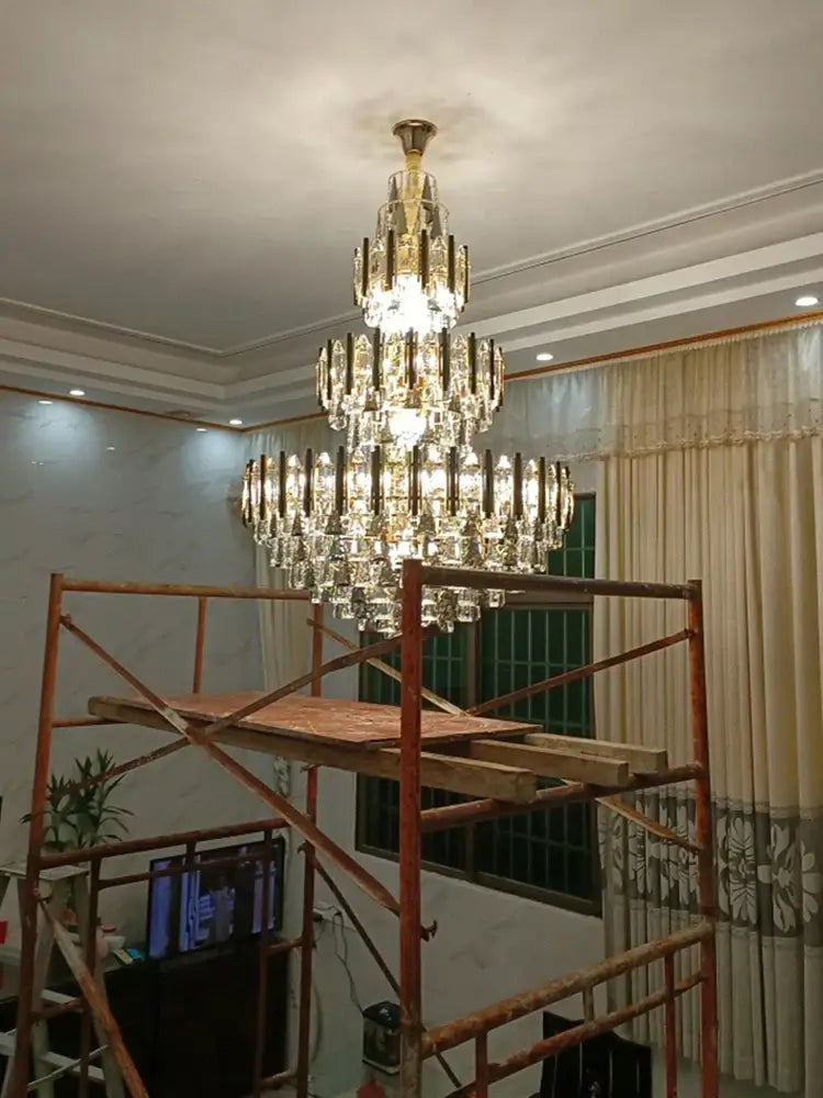 A multi-tiered modern crystal loft chandelier with gold-toned metal accents pendant light for living room decorbites crystal loft