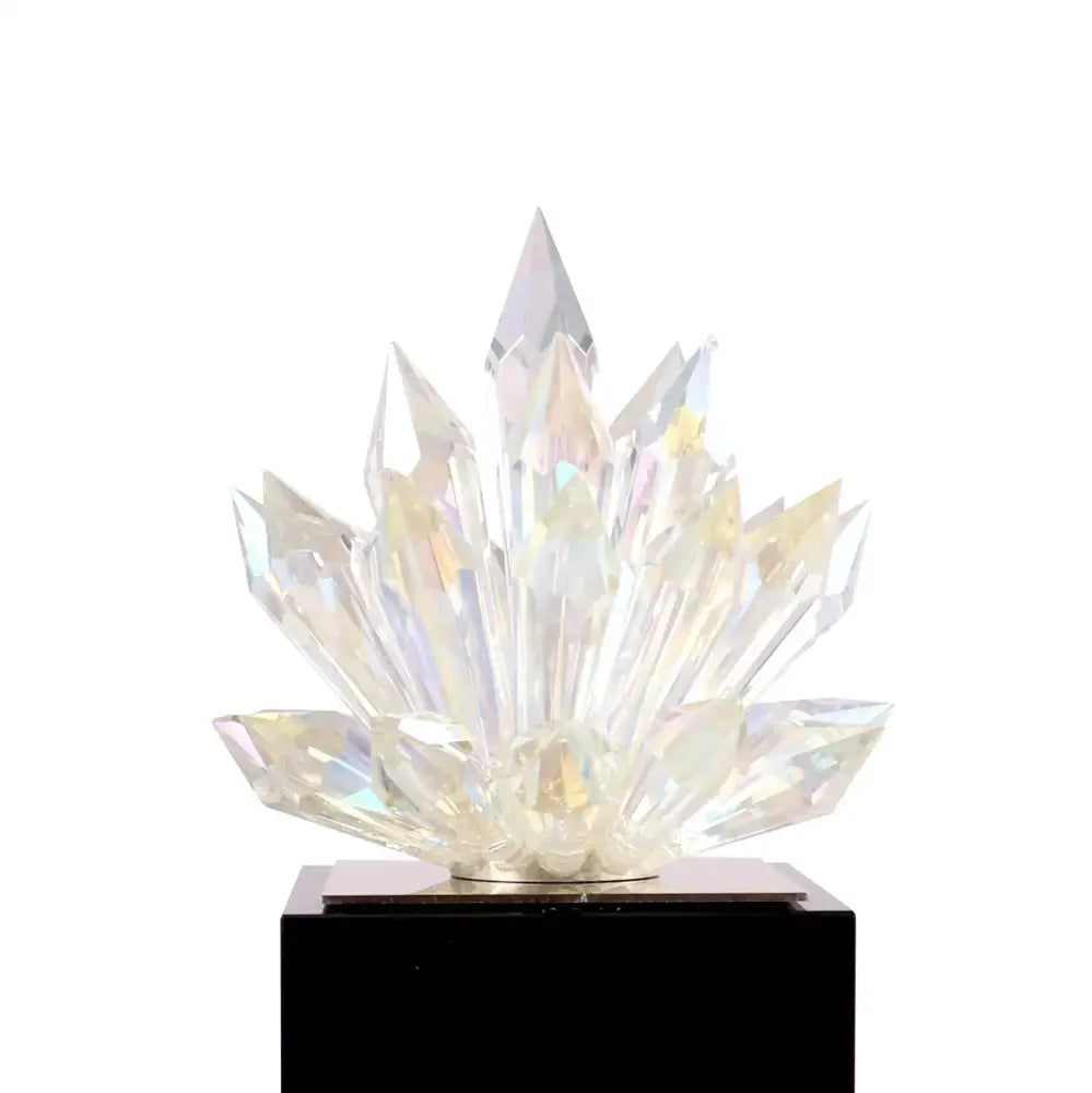 A translucent faceted crystal lotus tabletop decoration with a sparkling cluster and pointed apex for living room decorbites crystal lotus