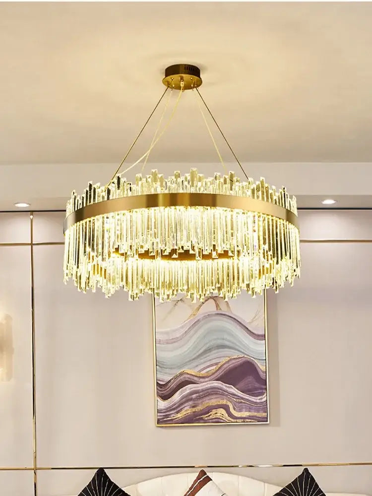Gold-toned DecorBites crystal pendant chandelier with cascading clear prisms for luxury modest crystal home decor