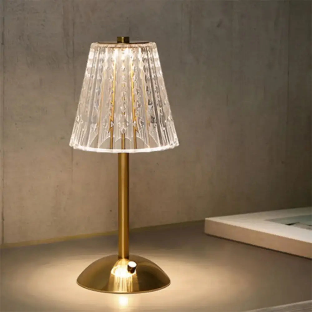 Decorbites crystal retro table lamp with gold-toned base and cut glass shade for a luxurious bedside atmosphere