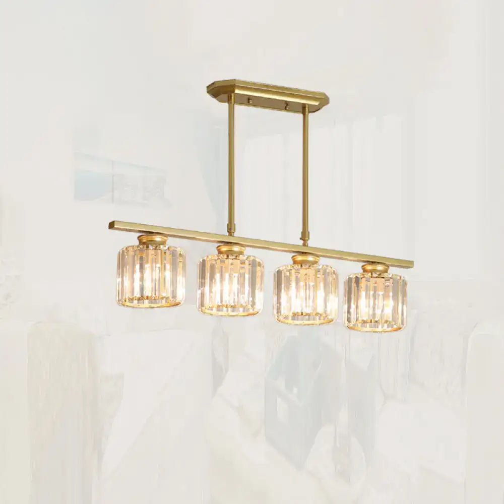 Gold-toned modern pendant light with four cylindrical crystal shade glass for dining room island by DecorBites™