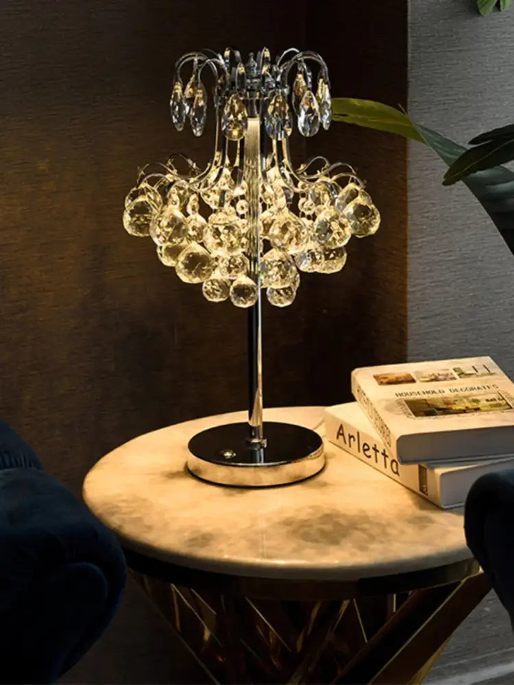 Elegant decorbites crystal table lamp with golden chandelier design and cascading teardrop crystals for bedroom lighting