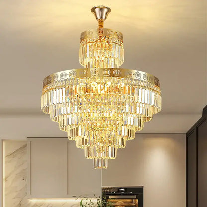Golden decorbites crystal villa chandelier with cascading crystal tiers and crown motifs for staircase lighting