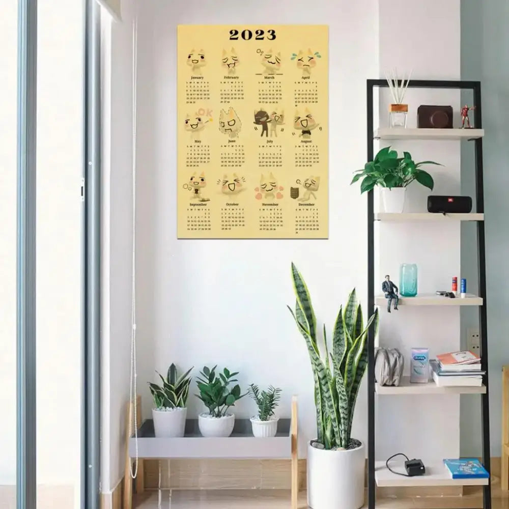 Yellow 2023 calendar featuring cartoon cat faces from decorbites™ cute 3d cat poster for home decor