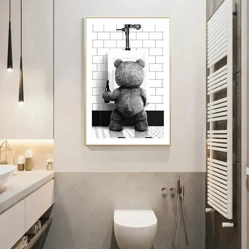 Black-and-white canvas print of a cute bear bathroom scene featuring a gray teddy bear holding a bottle by a urinal
