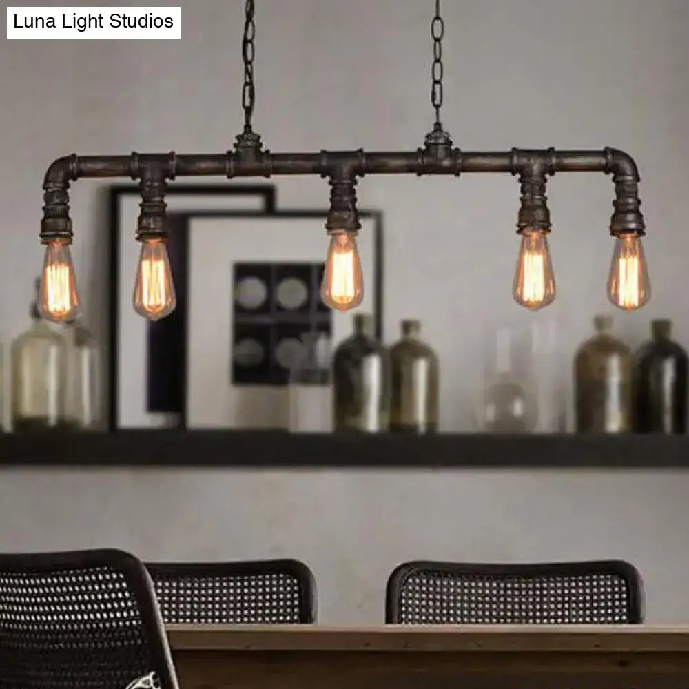 Industrial-style black iron pipe chandelier with four glowing filament bulbs suitable for 220v-240v ceiling light use