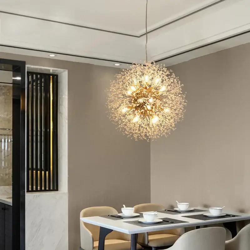 Golden spherical decorbites dandelion chandelier with crystal sparkle ball and warm glowing lights for living room