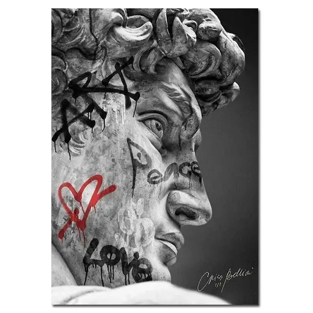 Black-and-white graffiti art canvas print of marble statue of David with red and black peace love text by DecorBites™