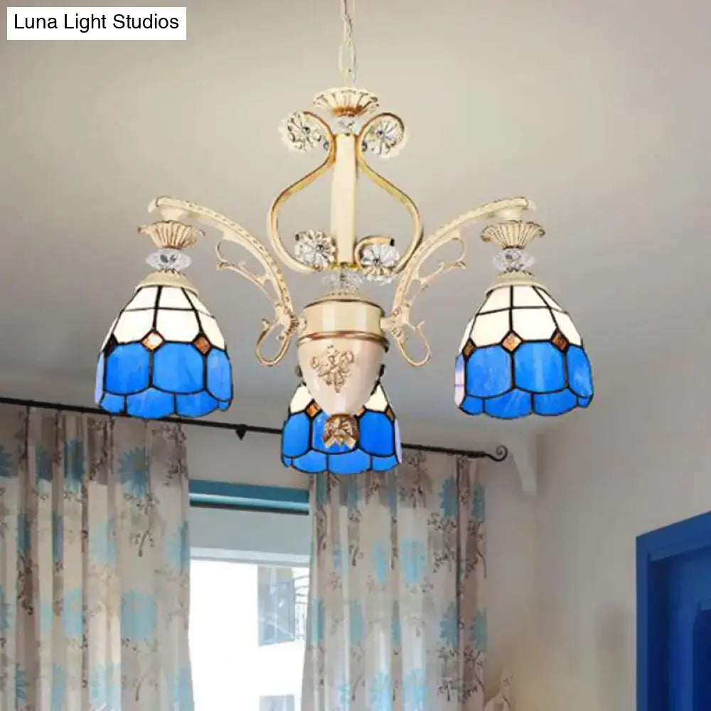 Decorbites dazzling baroque chandelier light fixture in blue and white stained glass with gold toned metal arms and cut glass pendants
