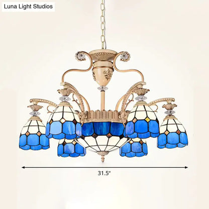 Decorbites dazzling baroque chandelier light fixture in blue and white stained glass with gold-toned metal accents