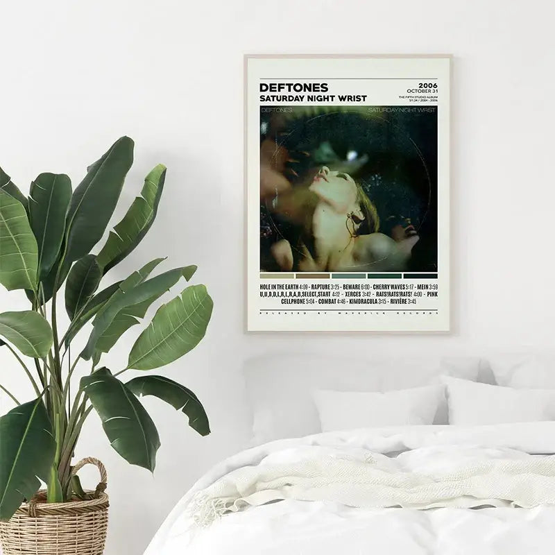 A framed deftones canvas painting featuring saturday night wrist album cover with dark moody image and white text